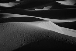 A grayscale  viewof desert sand dune