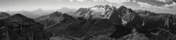 A panoramic grayscale view of the Marmolada Dolomite mountains in Italy
