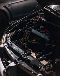 A closeup of the engine compartment of a Mitsubishi Evo