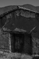 A grayscale of a century-old house in the municipality of Cabildo in Fissure, Chile