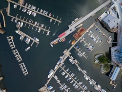 An aerial shot of the moored boats and ferries at the harbor of Horseshoe Bay, West Vancouver, British Columbia, Canada