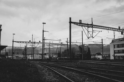 A grayscale shot of the railway station 