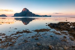 A gorgeous sea landscape with rocks at sunset in El Nido, Palawan, Philippines