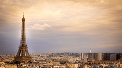 A landscape scene Effiel tower over cityscape under sunset scene in Paris, France