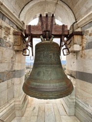 View of a bell situated on top of the leaning tower in Pisa, Italy