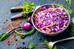 Fresh vegetables salad with red cabbage and carrot.Coleslaw salad