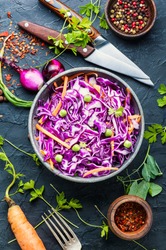 Fresh vegetables salad with red cabbage.Coleslaw in a bowl