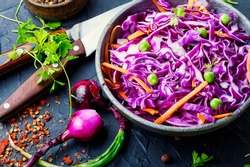 Fresh vegetables salad with purple cabbage.Coleslaw in a bowl