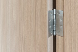 stainless door hinges on wooden swing door for interior design