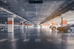 interior of parking garage with car and vacant parking lot in parking building, vintage style process