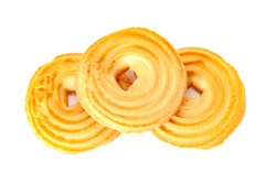 Round spritz shortbread isolated on white background. Danish butter cookies on white.