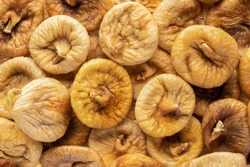 dried figs, top view. texture background for articles about healthy eating and proper lifestyle.