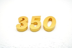    Number 350 is made of gold-plated teak, 1 cm thick, laid on a white painted aerated brick floor, giving good 3D visibility.                                 