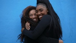 Mother and a teen daughter portrait smiling love and affection