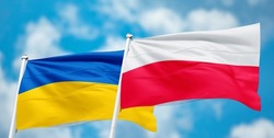 national flags of Ukraine and poland flag