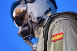 Air force pilot flight suit uniform with Spain flag patch. Military jet aircraft pilot