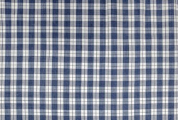 close up of a cotton fabric with checks and stripes