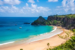 Beautiful view of sancho beach in fernando de noronha elected the most beautiful beach in the world for 3 times with a beautiful day, sky and blue sea, lots of sun, nature and few people