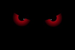 Scary red eyes on dark black background. Horror creepy eyes vector illustration for spooky decoration, Halloween design or frightful scene. Evil demon eyes with copy space for artwork design.