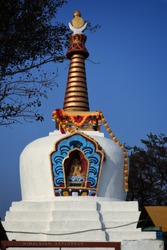 Boudha Stupa in Chhattisgarh, India. Most famous tourist attraction in Mainpat city of Chattisgarh with copy space. 
Beautiful white Buddha stupa in the form of an ancient architecture.