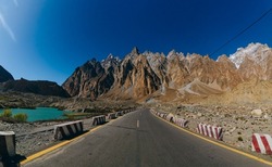 Tupopdan 6,106 metres (20,033 ft) also known as 'Passu Cones' or 'Passu Cathedral', lies to the north of the Gulmit village in Gojal Valley. It is the most photographed peak of the region. Also nearby
