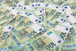 One hundred euro banknotes background. Lots of paper money. 100 euros. cash, paper money, banknotes