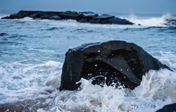 Waves crashing against rocks