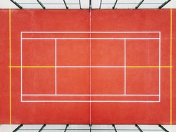 symmetrical aerial view of a paddle tennis court