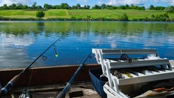 Zheltoe village, Dnipropetrovsk region, Ukraine - May 01, 2021: Fishing with a rod on the lake. Fishing tackle.