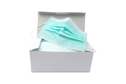 Pack of ear loop medical masks in box with medical mask on top isolated on white background with clipping path. anti virus and bacteria protective face air pollution,  protection concept.