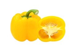 Whole and half of yellow bell pepper isolated on white background.