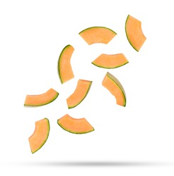 Flying fresh cantaloupe melon slices isolated on white background.