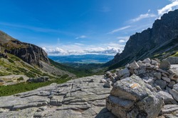 Turistic trail in High Tatras with view to valley on a sunny day, Slovakia