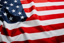 American flag waving in the wind. Flag USA as a patriotic background
