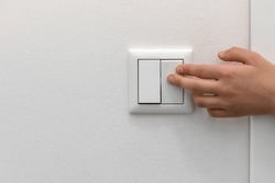 Switching Off the Light, Turning Off Light Switch. Saving concept. Copy space. 