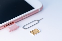 Image of smartphone SIM card taken on a white background