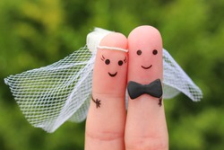 Fingers art of happy couple to get married. Concept of wedding ceremony.