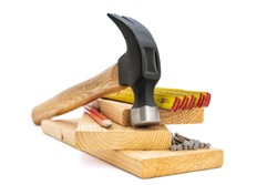 Close-up of hammer and carpenter's tools on a white background. Construction industry, do it yourself.