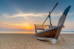 Traditional Arabian boat on a beach. Taken early morning on a beach near Al Wakrah, Qatar