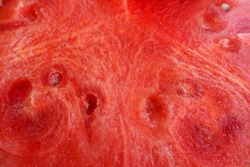 red juicy watermelon in the context of close . the texture of the watermelon