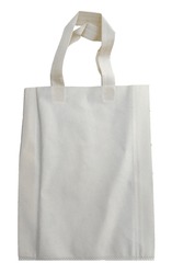 a beige or ivory non-woven fabric tote bag isolated on a white background. eco-friendly bag made of polypropylene