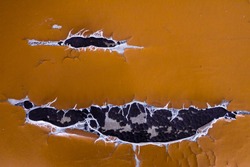 Abstract background of torn old leather sofa. Close up of lack old leather seat for pattern. 