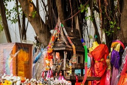 Phra Phum shrine near the tree,Traditional decoration of the Phra Phum Shrine in Thailand.