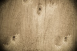 Natural knotted wood texture as background.