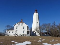 Winter scene of the Sandy Hook Lighthouse, Gateway National Recreation Area, Highlands, Monmouth County, New Jersey.