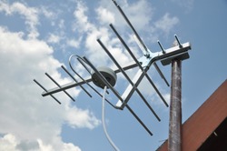 On the roof of the private cable is installed in the television antenna for the best signal.