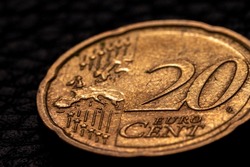 Close up shot of twenty euro cents with map of Europe on the coin face