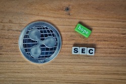 SEC versus ripple, ripple XRP coin + white dices