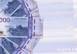 Background of 1000 Norwegian krone banknote,Group of money stack of 1000 Norway krone banknote a lot of the background texture, top view