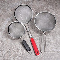 Set of cooking products including strainer spoon, fruit basket strainer, cooking basket strainers, splatter screen. These are very useful kitchen stuffs for women. 
